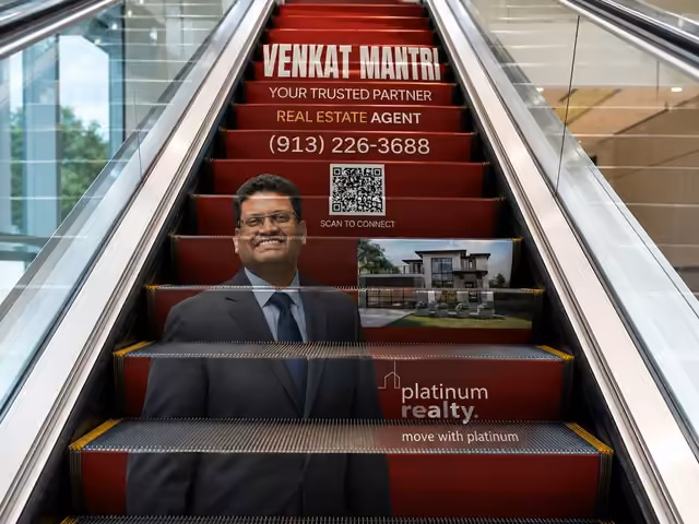 Escalator ad for Venkat Mantri: Your trusted partner, scan to connect